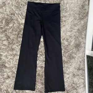 Lululemon women black wide leg, waistband hidden pocket yoga pants. Size S. Used
